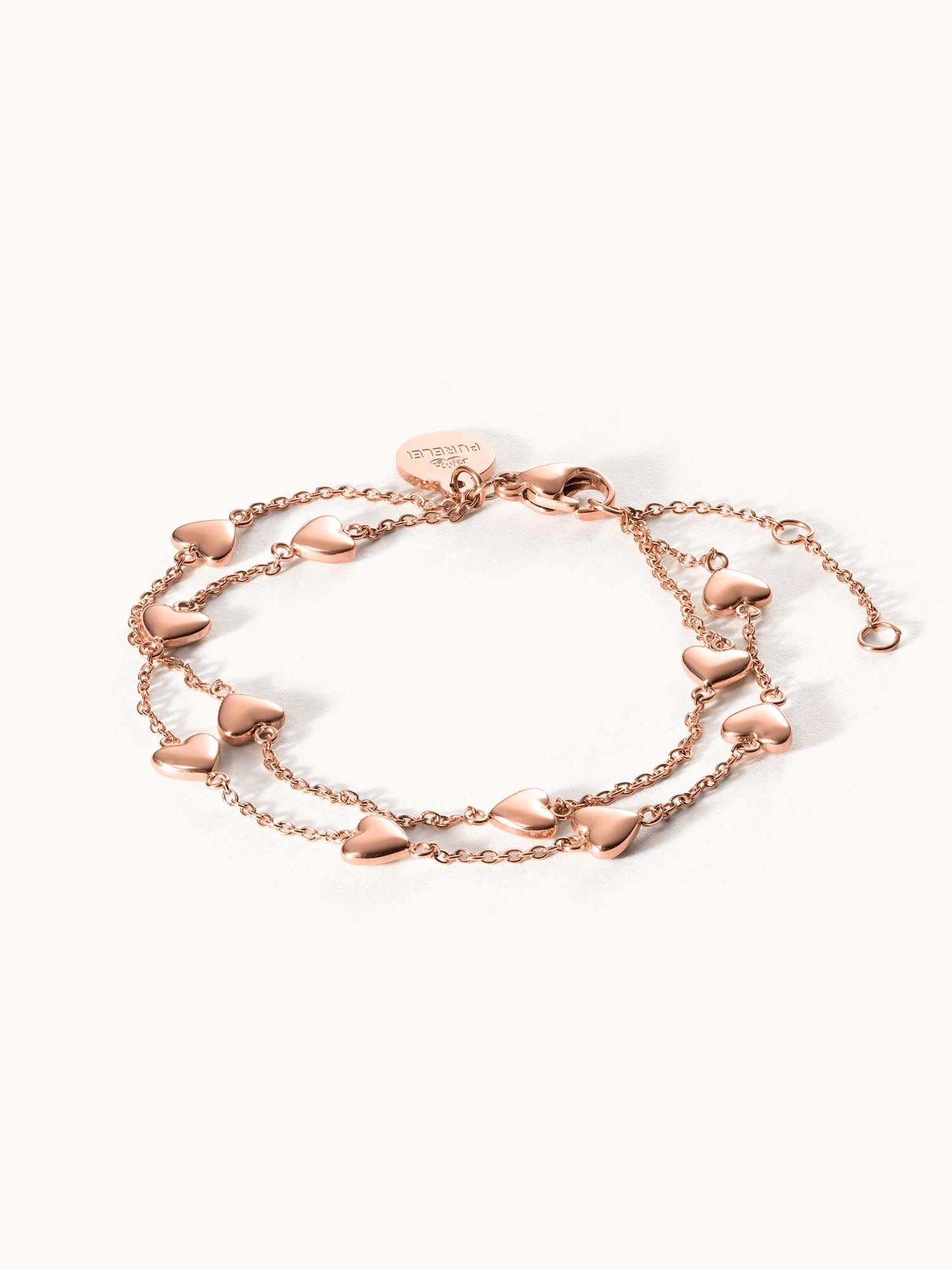 Roségoldenes Alohi Heart Armband mit zarten Herzen, verstellbar und nickelfrei, inspiriert von purem Aloha-Spirit.