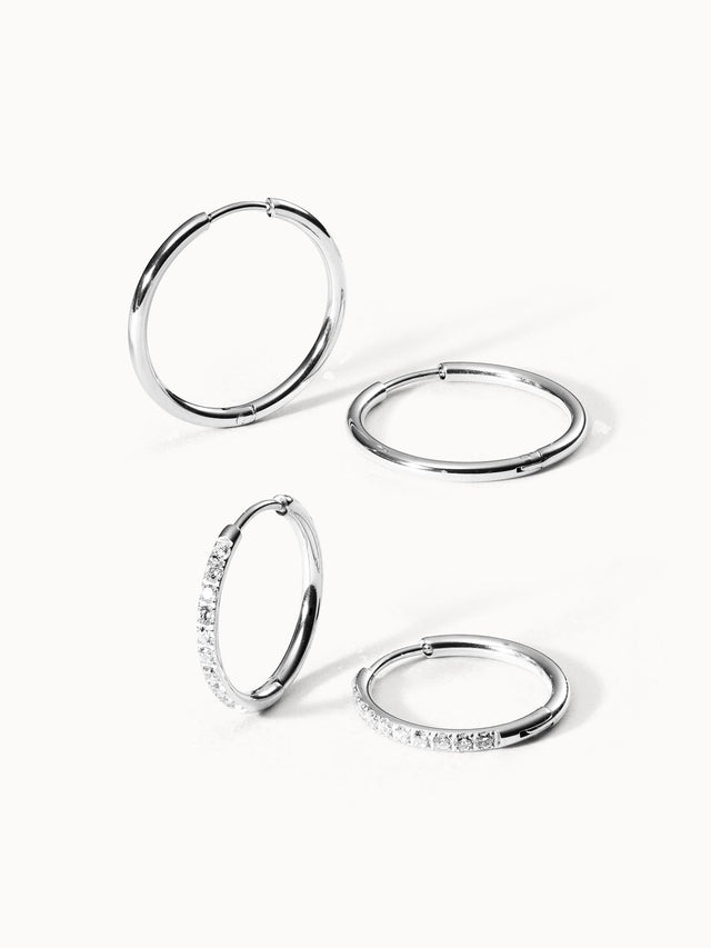 Silberne Creolen mit funkelnden Zirkonia von PURELEI, elegant und modern.