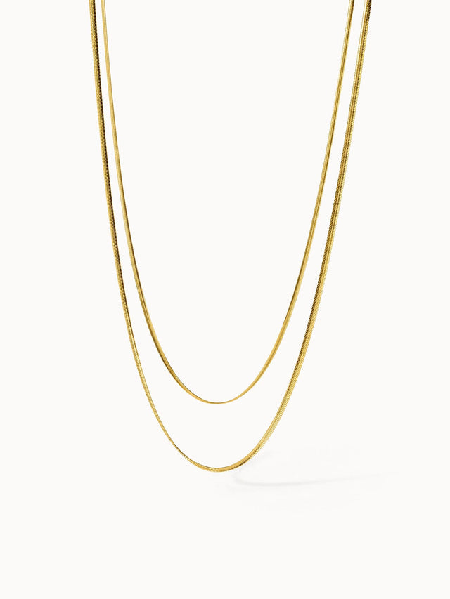 Zweireihige goldene Kette von PURELEI, elegant und minimalistisch, strahlt zeitlose Schönheit aus.