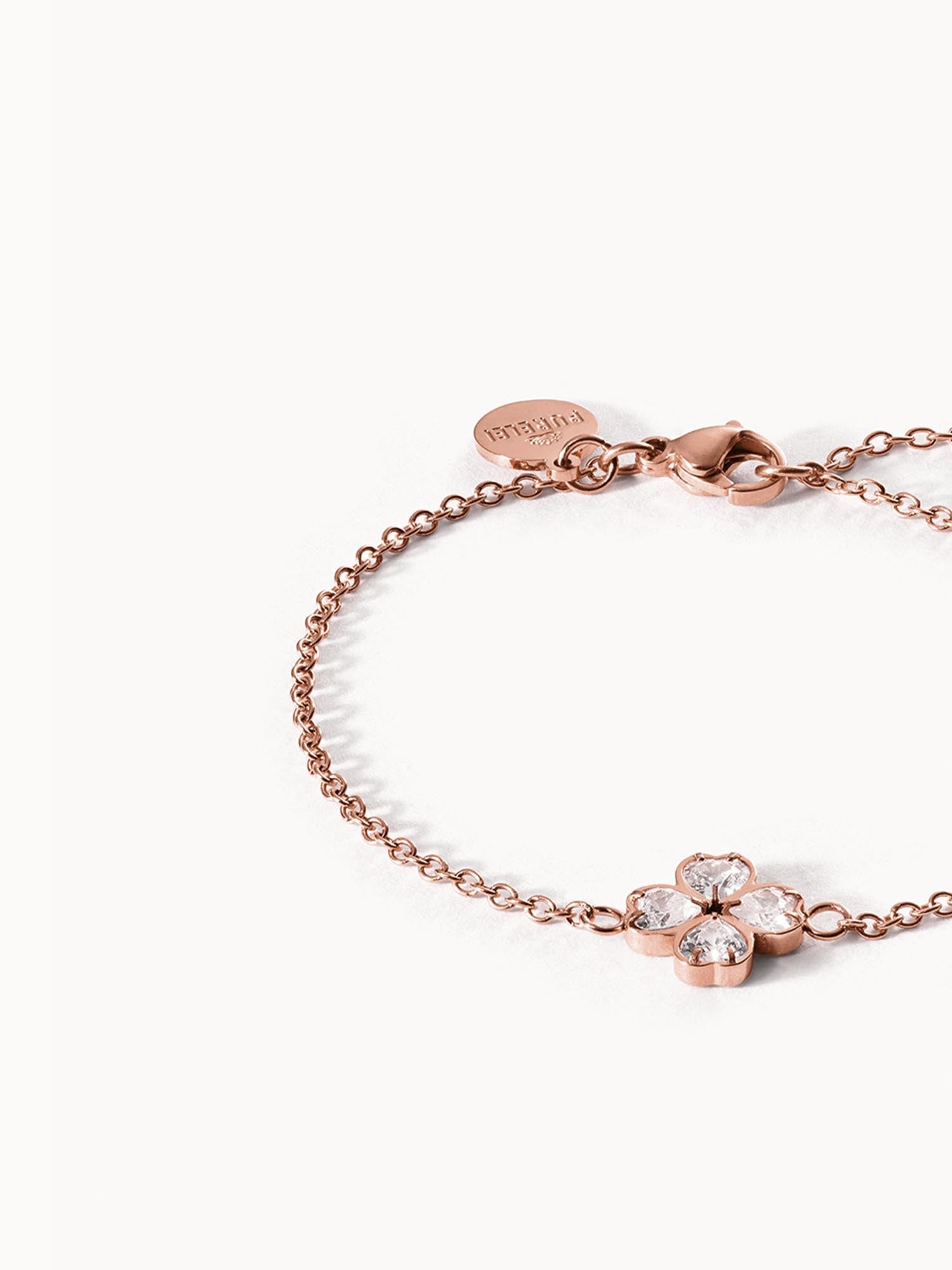 Roségoldenes Armband mit blütenförmigem Kristall-Design von PURELEI.