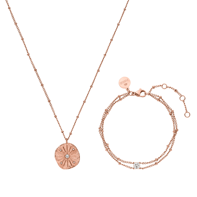 Roségoldene Kette und Armband mit funkelndem Anhänger von PURELEI, elegant und feminin.