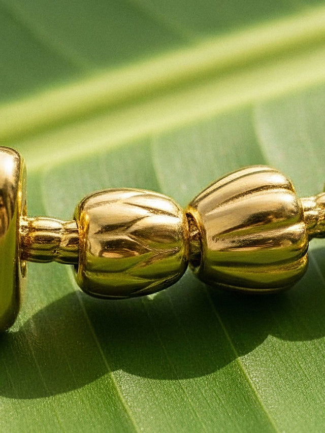 Lei Charm Bracelet with two Stopper Charms - INT PURELEI